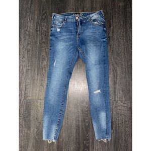 Light blue skinny jeans.